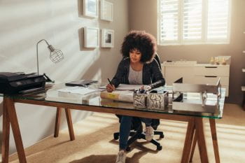 Woman working form home desk